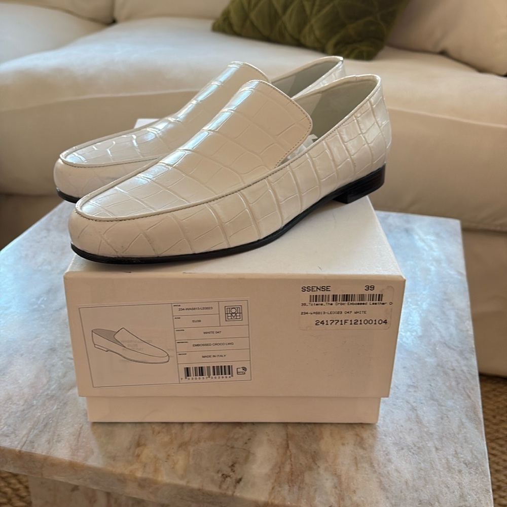 NWT Toteme
The Oval croc-effect leather loafers